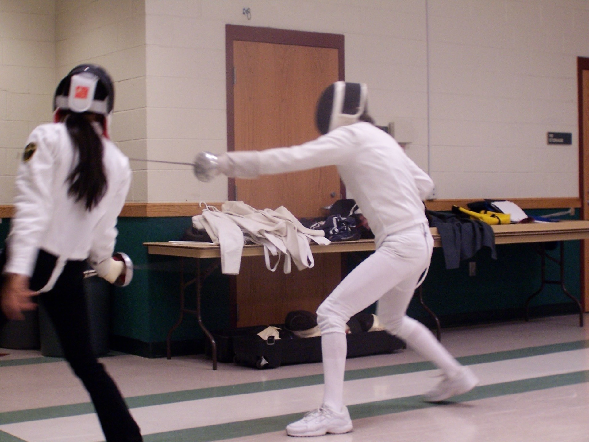 Fencers in action