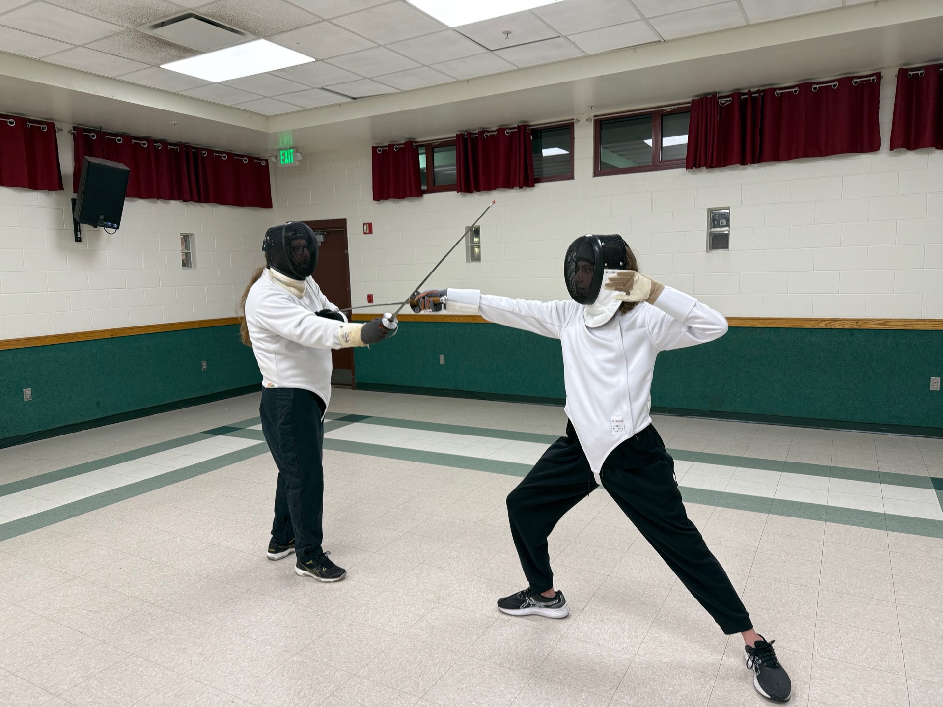 Fencers in action